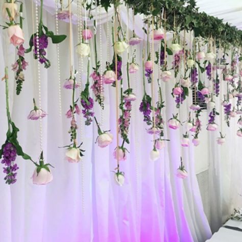 Beautiful hanging flower backdrop Hanging Flower Backdrop, Hanging Floral Decor, Sweet Sixteen Birthday Party Ideas, Fairy Garden Birthday Party, Fairy Garden Party, Desi Wedding Decor, Fiesta Decorations, Garden Birthday, Hanging Flower