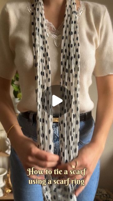 Zornitsa Ivova on Instagram: "How to tie a long scarf using a scarf ring 🤍 I have decided to show you another scarf tutorial using my favorite scarf ring, lately I have been super inspired to style all my scarves with it. I have worn a scarf tied this way with tees and ahirts but I'm sure it goes well with plenty of dresses too. Save this idea for your future inspo 🤍 . . .  #frenchstyle #lestyleàlafrançaise #stylinginspiration #stylingideas #zornitsaivova #classicstyle #frenchgirlstyle #yourvintagesoul #silkscarf #scarftutorial #silkscarves #vintagescarf #scarfstyle #scarffashion #scarf #stylingvideo #stylingtips #fashiontips #elegantstyle  #parisianstyle #silkscarf #classicstyle #parisianvibe #yourvintagesoul #vintagestyle #vintagefashion #theparisguru #scarffashion #scarfstyle #scarftu How To Tie A Long Scarf, Tie A Long Scarf, Long Scarf Tying, Swimsuit Coverup Ideas, Scarf Tying Tutorial, Ways To Tie A Scarf, Narrow Scarf, Ways To Tie Scarves, Tshirt Knot