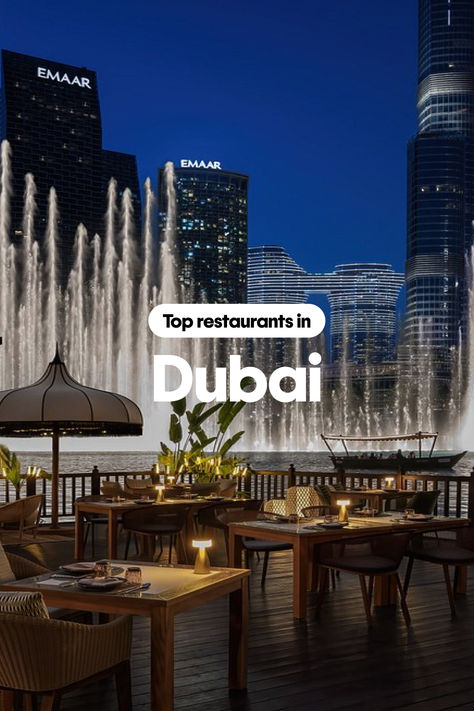 Image of a restaurant with a view of the Dubai fountains with overlay text that says, "Top restaurants in Dubai." Restaurants Dubai, Dubai Restaurant, Restaurant In Dubai, Restaurants In Dubai, Christmas Markets Germany, Dubai Travel Guide, Germany Christmas, Good Wednesday, Dubai Travel