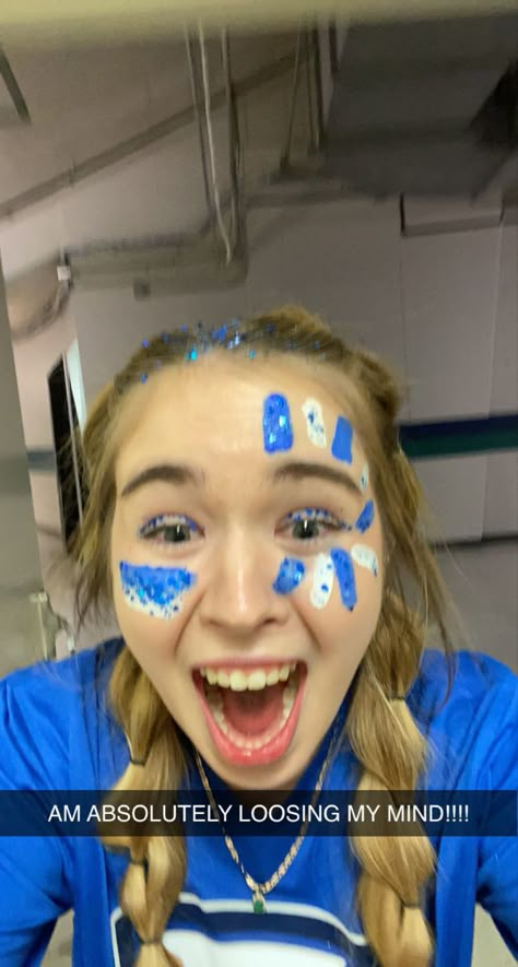 School Cheer Makeup, Face Paint Team Spirit, Face Paint For Fnl, Blue School Spirit Outfits, Homecoming Game Face Paint, Blue Out Game Outfit, Blue Out Day Spirit Week, Blue Out Spirit Day, Spirit Day Face Paint Ideas