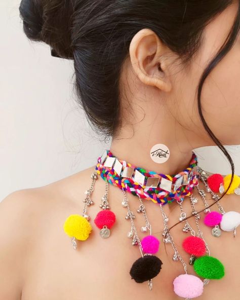 Are you looking for something unique for your Navratri look this year? If yes, checkout this beautiful Boho Necklace adorned with lots of ghungroo, coins, mirrors and colorful pom poms to match your garba vibes for this Navratri Season 🔥 This Boho Necklace has been one of our best selling navratri items due to its versatile look❤️ Visit indiashaat.com for more handmade jewellery options #indiashaat #navratrijewellery #bohojewelry #multicolorjewellery #helomaro [Handmade jewellery, mu... Unique Navratri Outfits Ideas, Navratri Necklace Handmade, Handmade Navratri Jewellery, Necklace For Navratri, Navratri Jewellery Handmade, Handmade Bohemian Jewelry For Navratri, Traditional Navratri Jewelry With Mirror Work, Bohemian Jewelry With Motifs For Navratri, Handmade Jewellery For Navratri