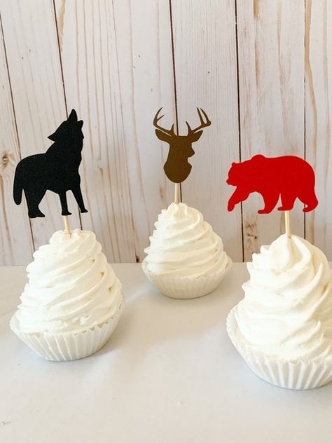 Declan & Smith Party Decor has designed cupcake toppers for your hunting birthday, woodland birthday, lumberjack birthday or hunting baby shower or woodland themed baby shower! Attached to 4" food safe wooden bamboo skewer, these deer, bear and wolf silhouette cupcake toppers will have you guests saying, "Wow!".     #woodlandbirthday  #huntingbirthdaydecorations  #lumberjackbirthdaydecorations  #deerheadcupcaketoppers  #deerheaddecorations Hunting Cupcakes, Hunting Birthday Party Decorations, Bear And Wolf, Barnyard Birthday Decorations, Hunting Birthday Party, Baseball Party Decorations, Barnyard Cake, Hunting Birthday, Hunting Baby