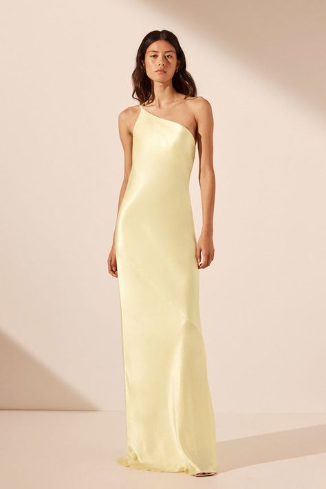 Asymmetrical maxi dress with open cowl back in lemon in a LENZING ECOVERO with luxurious satin finish. Contributing to a cleaner environment, LENZING™ ECOVERO™ viscose fibres omit 50% less greenhouse gas emissions and utilise less water than conventional viscose. Shona Joy Dress, Bridesmaid Skirts, Asymmetrical Maxi Dress, Yellow Bridesmaid Dresses, Bridal Tops, Yellow Bridesmaids, Shona Joy, Lemon Dress, Wedding Dress Shopping