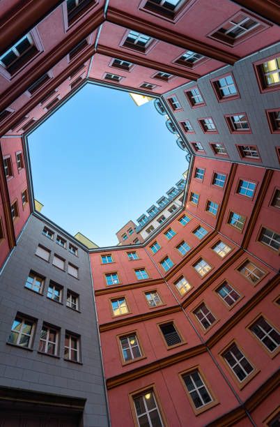 Worm's Eye View of Pink Concrete Building Under Blue Sky · Free Stock Photo Close Up Architecture, Perspective From Below, Worm's Eye View Photography, Future Thinking, Worms Eye View, Concrete Building, Perspective Drawing, Building Exterior, Sky And Clouds