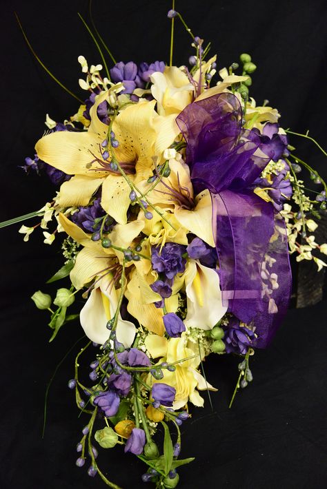 Brides Cascade Design Bouquet in Yellows and Purples by Island Bridal Bouquets by Elizabeth Rapunzel Wedding Theme, Cascade Wedding Bouquet, Purple Bridesmaid Bouquets, Rapunzel Wedding, Tangled Wedding, Yellow Lilies, Yellow Wedding Bouquet, Tangled Birthday, Cascading Wedding Bouquets