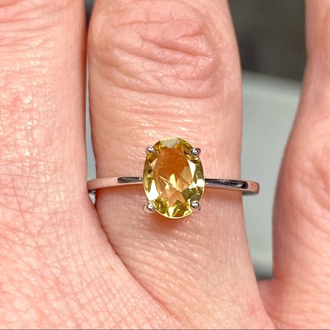 1 Carat Oval Citrine In 925 Sterling Silver Ring. Beautiful, Genuine 1 Carat Faceted Oval Solitaire. Perfect November Birthstone Ring, Promise Ring, Boho Engagement Ring Or Fashion Ring. Very Dainty And Minimalist. Perfect For Women And Children. Multiple Sizes Available (Sizes 6, 7, 8, 9). If You Don’t See Your Size, Message Me. Our Jeweler Can Size This To Fit You. Birthstone, Gemstones, Authentic, Citrine, November, Yellow, Ring, Jewelry, Kids, Children, Women, Gift, Minimalist, Boho, Solitai November Stone, Trendy Engagement Rings, Yellow Topaz Ring, Citrine Engagement Ring, Boho Engagement Ring, April Birthstone Ring, Birthstone Engagement Rings, Citrine Ring Engagement, Gemstone Solitaire Ring