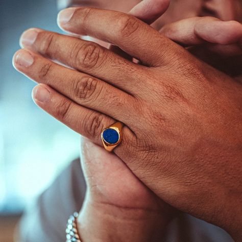 Lapis Lazuli Ring. An Oval Royal Blue Stone encompassed by a 18k Gold Signet completed with a polished finish. No two rings are the same, the natural stone has a mixture of Gold, white & blues perfectly complimenting the Gold ring & a great ring to pair with the Lapis lazuli Pendant. A perfectly designed ring to wear on your pinky / index. Unisex, Mens & Womens sizes available. Also available in Black Onyx (Real stone) & Green Opal (Lab Created). DETAILS  Materials: Stainless Steel (Base) & 18K Mens Ring Gemstone, Lapis Lazuli Ring Men, Gemstone Rings Men, Mens Gold Signet Rings, Gold Rings For Men, Men Signet Ring, Signet Ring Gold, Mens Pinky Ring, Mens Jewellery