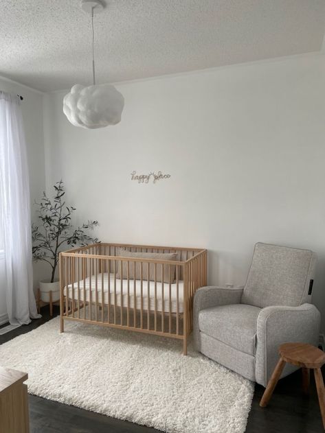 Simple Minimalist Nursery, Minimal Neutral Nursery, Nursery Room Minimalist, Beige Crib Nursery, Nursery Dark Floors, Dark Floor Nursery, Apartment Friendly Nursery, Minimalistic Nursery Ideas, Nursery Aesthetic Neutral