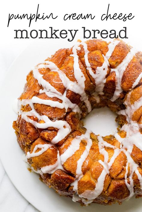 Pumpkin cream cheese monkey bread is an easy to make monkey bread with warm pumpkin pie spices and cream cheese in every sweet bite! Pumpkin Monkey Bread Recipe, Cream Cheese Monkey Bread, Cheese Monkey Bread, Pull Apart Monkey Bread, Pumpkin Pull Apart Bread, Pumpkin Monkey Bread, Pan Desserts, Pumpkin Spice Treats, Easy Monkey Bread