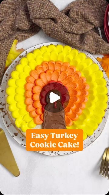 Julianne Dell_Beyond Frosting on Instagram: "Wanting to impress this Thanksgiving? 🦃✨ Make this adorable Turkey Cookie Cake! With a soft sugar cookie base and creamy vanilla buttercream, it’s the perfect treat to wow your friends and family. I love that it’s easy to make. I have a simple tutorial and template for the turkey you can use too! 

Want the recipe? Comment TURKEY below ⤵️ and I’ll send it over!
Recipe: https://beyondfrosting.com/turkey-cookie-cake/

#ThanksgivingDesserts #TurkeyCookieCake #HolidayBaking" Turkey Cake Design, Easy Turkey Cake Ideas, Thanksgiving Cakes Easy, Cookie Cake Thanksgiving, Turkey Cake Ideas, Thanksgiving Cakes Ideas, Thanksgiving Cookie Cake, Turkey Cakes, Thanksgiving Cake Ideas