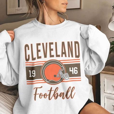 Vintage Cleveland Football Sweatshirt, Cleveland Football Comfort T-shirt, Cleveland Shirt, Browns shirt, Browns Hoodie Vintage. With our wonderful selection of shirts, you may uplift your outfit. Our shirts, which are made of high-quality fabrics, provide unmatched comfort and timeless style. Our custom fit shirts are ideal for any setting and are made to enhance your appearance and self-confidence. Our shirts are the height of adaptability, whether you're dressing up for a formal occasion or c Brown Hoodie, Football Sweatshirt, Brown Shirt, Trendy Graphic Tees, Light Blue Shirts, Cleveland Browns, Football Shirt, Classic Shirt, Cleveland