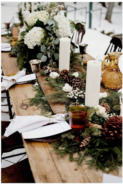 Winter wedding table spread complete with pinecones, Evergreen branches, white flowers and vintage skis in the Ottawa Valley. Natal Natural, Christmas Wedding Themes, Winter Wedding Table, Winter Wedding Centerpieces, Reception Table Settings, Winter Wedding Venues, Elegant Winter Wedding, Boda Diy, Rustic Winter Wedding