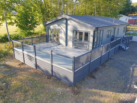 Head over to our website to download a copy of our brochure to learn more about what we can do for your holiday home/ lodge/ caravan & more.. Caravan Decking, Decking Ideas, Pvc Decking, Glass Balustrade, Remodeling Mobile Homes, Caravan Park, Mobile Homes, Mobile Home, Wrap Around