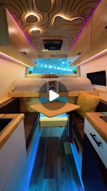 Project Van Life 🚐 on Instagram: "A blend of luxury and vibrant design, this Mercedes Sprinter by @sandyvansofficial is a showstopper on the road. With a unique extendable bed for ultimate comfort, a custom-crafted countertop, ambient lighting, and an artistic ceiling that brings character to every mile—this van’s got it all. No indoor bathroom, but who needs one with views this good? 🌄 Ready to experience van life on a whole new level!  🎥 by @diamondcutproductions1   #campervanhacks #vanlifeproject #vanlifecommunity #motorhome #vanbuildseries #vanbuild #vanlifeculture #vanlifesociety #campervan #camperconversions #camperlifestyle #campervanlifestyle #rvliving #customcampervan #vantour" Van Lighting Ideas, Camper Van Lighting, Van Kitchen Storage, Campervan Lighting, Campervan Hacks, Extendable Bed, Camper Van Kitchen, Van Kitchen, Custom Camper Vans