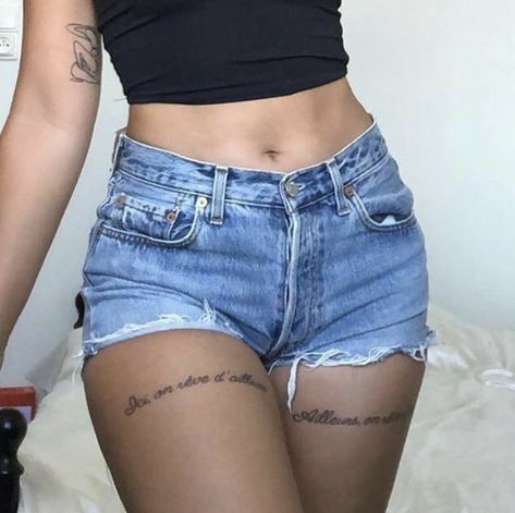 Script Tattoo Thigh Women, Thigh Tats For Women Words, Small Front Thigh Tattoos, Day Concert Outfit Summer, Quote On Thigh Tattoo, Front Thigh Tattoos Quote, Tattoo For Thigh For Women, Thigh Script Tattoos Women, Thigh Writing Tattoo Women