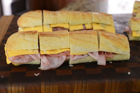 Ham And Cheese French Bread, French Bread Sandwiches For A Crowd, French Bread Sandwich Ideas, Party Ham Sandwiches, Oven Sandwiches, Baked Ham And Cheese Sandwiches, Oven Baked Ham, Bread Printable, Hot Ham And Cheese Sandwiches