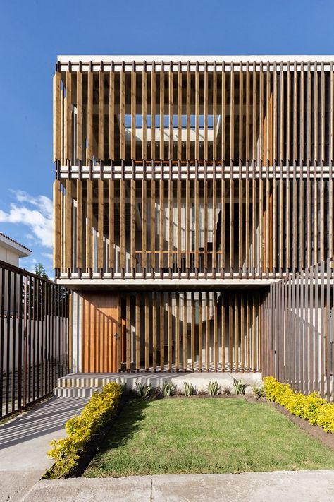 Edificio Criba in Ambato, Ecuador by Rama Estudio Wooden Screen Divider, Screen Divider, Architectural Orders, Romanesque Architecture, A I, Wooden Shutters, Wooden Screen, Cultural Architecture, Education Architecture