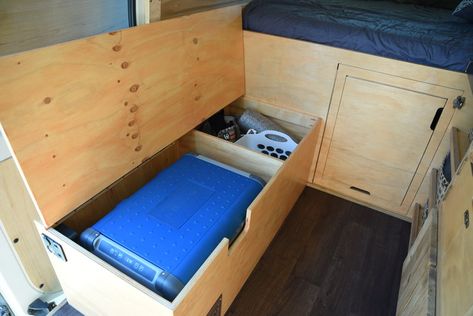 The fridge bench showing our fridge and the storage area for clothes and shoes. Click here for detailed instructions on how to make it. #vanlife #vankitchen #campervan #vanconversion Camping Chuck Box, Build A Bench, Camper Van Build, Box Splits, Diy Camper Van, Cedar Paneling, Van Storage, Solar Systems, Van Build