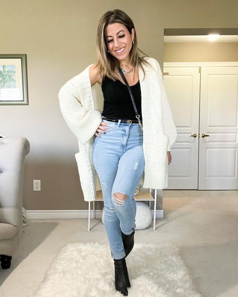 Light blue jeans, cream cardigan, black booties. Black tank, Gucci belt, small crossbody bag Sherpa Cardigan Outfit, Off White Cardigan Outfit, White Cardigan Outfit Aesthetic, Jeans And Cardigan Outfit, Cardigan Outfit Fall, Professional Fits, Jeans And Cardigan, White Cardigan Outfit, Cardigan Outfit Aesthetic