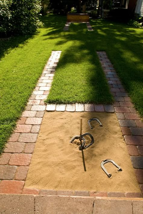 Brick Horseshoe Pit | Old wooden boards instead of sand (or it wouldn't last 2 minutes in the PNW w/o becoming overgrown!). - Removable stake: bury hollow pipe in ground to slide stake into. No impalement accidents this way! - Keep shoes and stakes in small wooden cupboard attached to nearby tree. Shed Makeover, Living Pool, Brick Walkway, Yard Games, Backyard Games, Traditional Landscape, Backyard Retreat, Backyard Living, Kew Gardens