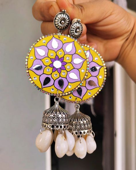 Mandala Handmade earrings in shade of yellow & purple 💛 💜 The best thing about these earrings is that they are lightweight & water-resistant 🤗 DM to order or to get customise 🫶 #handmade #handpainted #handpaintedearrings #earrings #lotusearrings #lotus #earringsoftheday #earringsofinstagram #handmadeearrings #mandala #homedecor #earringideas Mandala Earrings Diy, Diy Indian Earrings, Diy Elegant Earrings, Simple Earing, Mdf Earrings, Mandala Paint, Jewellery Tutorial, Shade Of Yellow, Bamboo Jewelry