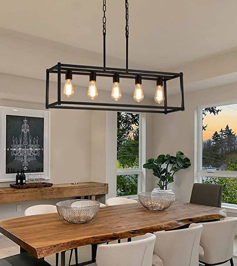 Dining Room Island Light Perfect Design：This rectangular 5-lights black kitchen island chandelier is finished with an open geometric metal frame and a modern industrial black finish and configured with five retro E26 bases, the simple linear pendant light fixture is the perfect addition to your home renovation. As an Amazon Associate I earn from qualifying purchases. Black Dining Room Light Fixture, Rectangle Kitchen Island, Modern Industrial Chandelier, Dinning Room Light Fixture, Cage Light Fixture, Lights Over Dining Table, Rectangle Kitchen, Dinning Room Lighting, Dining Light Fixtures