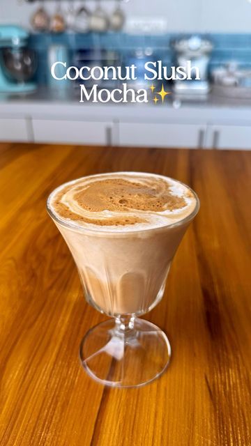 Saloni Kukreja🌷 on Instagram: "Honey Mocha Coconut Slush ☕ This is a really easy way to change up your coffee routine if you’re looking to try out new recipes, it kinda tastes like your dessert and your coffee all at once! 

150-200 ml coconut milk 
(Frozen in an ice cube tray overnight) 
2 tbsps coconut milk to blend 
Sweetener of choice 

Coffee: 
2 tsps instant coffee powder 
1.5 tsps cocoa powder 
1/2-1 tsp honey 
3-4 tablespoons warm water 

Process: 
- Pulse the coconut milk ice cubes with coconut milk and honey until the desired consistency is reached 
- ⁠Freeze this while preparing the coffee
- ⁠Combine coffee powder with cocoa powder, honey and warm water 
- ⁠Froth or combine it well 
- ⁠Serve the coffee over the coconut slush and enjoy! 

#coffee #coffeelovers #coffeetime #mocha Saloni Kukreja, Milk Ice Cubes, Honey And Warm Water, Enjoy Coffee, Coffee Powder, Instant Coffee, Coffee Routine, Milk And Honey, Ice Cube Tray