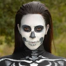 Celeb Skeleton Makeup—Here's How to Do It! - E! Online Men Skeleton Makeup, Skeleton Makeup Diy, Pretty Skeleton Makeup, Half Skeleton Makeup, Easy Skeleton Makeup, Skeleton Face Makeup, Skeleton Makeup Tutorial, Half Skull Makeup, Fairy Halloween Makeup