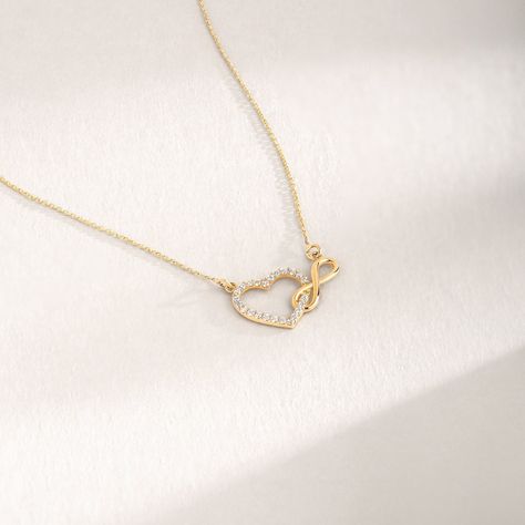 "Love can be found even in the tiniest details. This infinity heart necklace may count as a tiny detail but it definitely has the biggest meaning. It is the most elegant representative of immortal love. D E T A I L S * Made to Order. * 100% 14k Solid Gold * Choice of Gold Color: Yellow Gold, Rose Gold, White Gold * Cubic zirconia * Pendant Height: 7 mm / 0.27 inch * Pendant Width: 4 mm / 0.15 inch * Length: 14\", 16\", 18\", 20\", 22\" (Got a little note that can help you in the photos.) * Ready Necklace Drawing, Intertwined Hearts, Gold For Women, Infinity Pendant, Infinity Heart, Infinity Necklace, 14k Gold Necklace, Handcrafted Necklace, Love Necklace