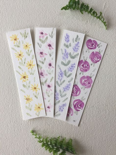 These hand painted original watercolor bookmarks are a great unique gift for the book lover in your life.  These bookmarks are hand painted by me on 140 Ib cold press watercolor paper and are about 1.5 inches wide by 6 inches long. Please expect variations between bookmarks, because each of them are handmade and hand painted by me. * 140 Ib cold press watercolor paper * 1.5 x 6 inches Watercolour Bookmarks, Floral Bookmarks, Bookmarks Diy, Handmade Bookmarks Diy, Bookmark Ideas, Creative Bookmarks, Gift For Book Lover, Watercolor Bookmarks, Diy Watercolor Painting