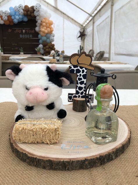 Vaquero 1st Birthday Party, My 1st Rodeo Birthday Party Decorations, First Rodeo Party Centerpieces, Rodeo Theme Centerpiece Ideas, First Rodeo Birthday Party Centerpieces, 1st Rodeo Table Centerpieces, Cow Party Centerpieces, Cow Print Party Centerpieces, Farm Themed Birthday Party Centerpieces