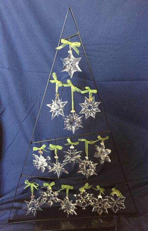 My Swarovski snowflake ornaments...have one for every year since we got married (2000-2014). Finally found a "tree" to display them all Snowflake Display, Christmas Crystals, Swarovski Christmas Ornaments, Swarovski Figurines, Swarovski Snowflake, Swarovski Christmas Tree, Swarovski Ornaments, Swarovski Christmas, Snowflake Tree