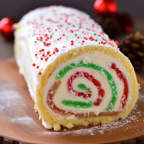 Christmas vanilla roll cake Christmas Pattern Roll Cake, Bush De Noel Yule Log Cake Recipes, Christmas Cake Roll Recipes, Christmas Vanilla Roll Cake, Jelly Roll Cakes, Christmas Swiss Roll, Christmas Roll Cake, Vanilla Roll Cake, Roll Cake Recipe Vanilla