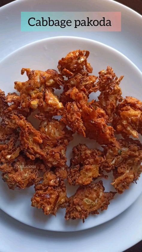 · 5 servings

 

CABBAGE PAKODA - CRISPY TEA TIME SNACKS RRECIPEIngredients:
 • Cabbage - half, shredded
 • Gram flour - 1/2 cup
 • Rice flour - 3 tbsp
 • Ginger garlic paste - 1 tsp
 • Chilli powder - 1/2 tbsp
 • Curry leaves - 1 tsp, chopped
 • Green chilli - 1
 • Hing - 1/2 tsp
 • Hot oil - 1 tbsp
 • Salt as required
 • Water as required
 • Oil for frying Veg Kholapuri Recipe, Cabbage Pakoda Recipe, Cabbage Recipes Indian, Cabbage Curry, Snacks Yummy, Tiffin Recipe, Dhokla Recipe, All Food Recipes, Spicy Snacks Recipes