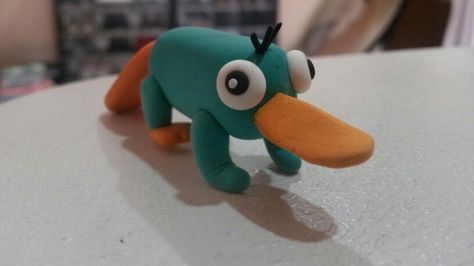 Perry The Platypus. I made it out of Jumping Clay :) #clay #jumpingclay #perry #perrytheplatypus Clay Date Ideas Easy Animals, Perry The Platypus Clay, Plastelin Ideas, Easy Clay Sculptures, Jumping Clay, Perry The Platypus, Clay Figurines, Clay Clay, Clay Crafts Air Dry