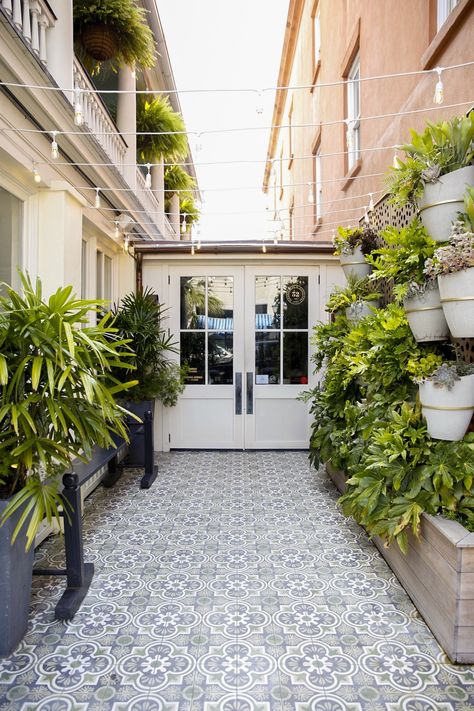 Courtyard Entrance || Indoor/Outdoor Event Space || Parcel 32 Private Events || Patrick Properties Hospitality Group || Corporate Events || Rehearsal Dinners, Welcome Parties, Baby Shower, Bridal Shower, Birthday Party, Intimate Weddings || Charleston, SC || Cameron Cotten Photography Parcel 32 Charleston, Rehersal Dinner Charleston, Outdoor Event Space, Courtyard Entrance, Wedding Venues South Carolina, Charleston Historic District, Spanish Courtyard, Night Wedding Reception, Luxury Weddings Reception