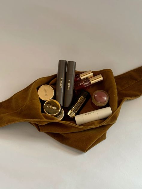 Merit beauty, makeup bag, merit makeup, beauty content, product photo, ugc content, beauty, makeup look, makeup products, lifestyle. Product Placement Ideas, Merit Makeup, Merit Beauty, Beauty Content, Holiday Gift List, Ugc Content, Makeup List, Ethereal Makeup, Edgy Makeup