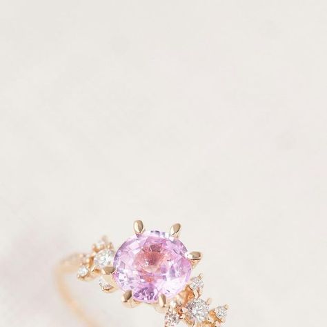 Sofia Zakia on Instagram: "One of a Kid - 1.0ct sapphire Tethys 🎀 A distant heavenly body in a sea of stars. A magical Sofia Zakia one-of-a-kind. This ring features a dreamy 1.00-carat (6.0mm) baby pink sapphire, flanked by an incandescent burst of luminous, star-like diamonds. We only have one of these left and she’s ready to ship!" Pink Sapphire Wedding Rings With Round Band, Pink Sapphire Promise Ring With Diamond Accents, Pink Sapphire Wedding Ring Round Cut, Wedding Pink Sapphire Rings With Accent Stones, Pink Crystal Ring With Accent Stones, Round Cut, Sofia Zakia, Sea Of Stars, A Sea, Dream Ring