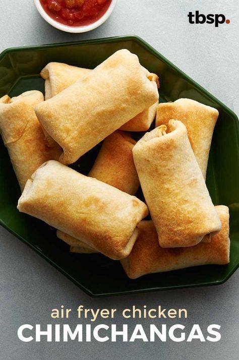 These homemade chicken chimichangas taste just like a deep-fried burrito from your go-to Mexican restaurant, but they’re homemade and ridiculously easy to prep. R Chicken Burritos Air Fryer, Air Fried Burritos, Air Fry Burritos, Air Fryer Chimichangas Chicken, Deep Fried Burritos, Air Fryer Chicken Burrito, Fried Chimichanga, Fried Burritos, Chicken Chimichangas