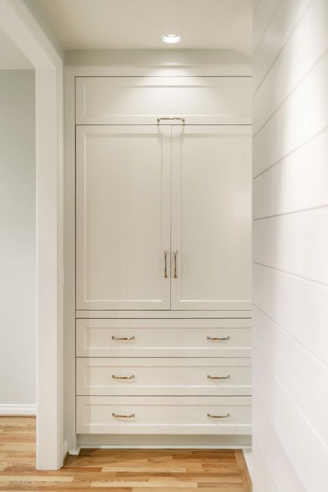 Instead of a walk-in closet, this master suite features built-in cabinets customized for clothing storage. #builtins #closet #cabinets #customcabinets #boardandvellum Closet To Cabinet Conversion, Cabinet For Clothes, Built In Closet Cabinets, Built In Armoire Closet Master Bedrooms, Farmhouse Walk In Closet, Turning A Closet Into A Built In Cabinet, Built In Laundry Hamper Master Closet, Built In Linen Closet With Hamper, Convert Closet To Built In Cabinets