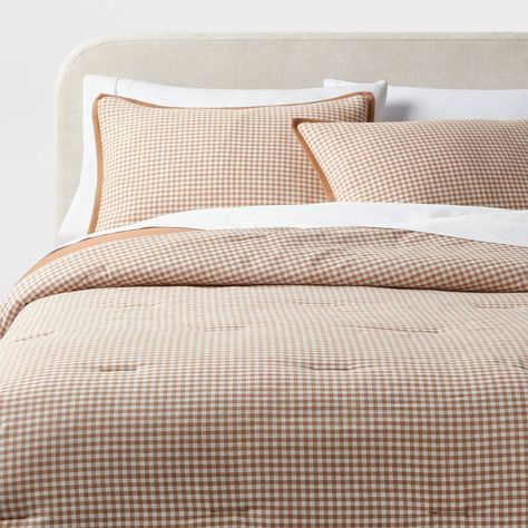 Add vintage vibes to your bedscape with this Mini Gingham Comforter and Sham Set from Threshold™. Made of 100% cotton, this bedding set features a soft-filled comforter adorned with mini gingham checks and a coordinating solid-color reverse, adding depth and dimension to your bedroom sanctuary. Completing the set are two matching pillow shams with a convenient six-inch envelope closure for secure pillow insert placement and easy removal. Threshold™: Looks like home, feels like you. Vintage Master Bedrooms Decor, Gingham Comforter, Charleston Bedroom, Best Comforters, Down Comforter Bedding, Brown Gingham Bedding, Cottagecore Bedding, Bunker House, Guest Room Bedding