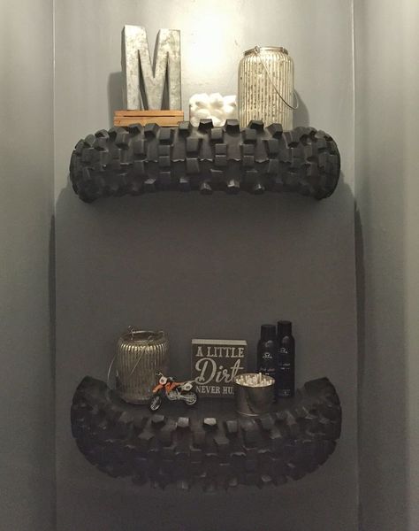 Dirtbike tire shelves we made and mounted above our toilet! Cave Diy, Dirt Bike Room, Bike Room, Man Cave Basement, Man Cave Home Bar, Man Caves, Man Cave Garage, Big Boy Room, Diy Interior