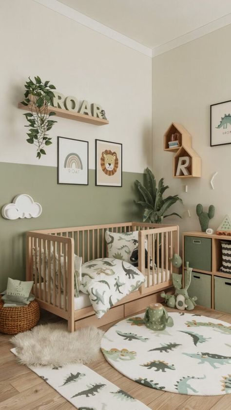 Dinosaur-themed baby boy nursery with green accents, playful decor, and natural wood furniture. Green Animal Themed Nursery, Simple Nursery Paint Ideas, Irish Nursery Theme, Nursery Ideas Painting, Dino Nursery Ideas, Boys Room Dinosaur Theme, Dinosaur Theme Nursery, Jurassic Park Nursery, Nursery With Green Accents