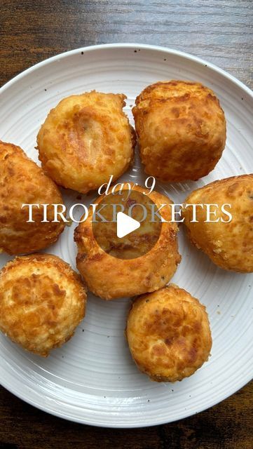 Marina L Georgallides🌞Food Content Creator✨ on Instagram: "Day 9 of EAT LIKE A GREEK 🇬🇷✨ and we’re making TIROKROKETES - deliciously crispy on the outside and cheesy on the inside Greek fried cheese balls 🤤 that make for the PERFECT APPETISER!   📌RECIPE BELOW - makes 7 cheese balls   Gather  65g cheddar cheese, grated  65g Gruyere cheese, grated  130g feta,  crumbled  1 egg 30g self-raising flour  Dash of milk Crushed black pepper  30g plain flour   Veg oil for frying   Method  1.) In a bowl, add the grated cheeses and crumbled feta, along with the self-raising flour, egg, milk and black pepper. Mix until it’s well combined. 2.) Take about a tablespoon of the mixture and roll into a ball, and repeat with the rest of the mixture.  3.) In a separate bowl, place the plain flour. Coat eac Fried Feta Cheese Recipes, Greek Fried Cheese Balls, Oven Fried Feta Rolls, Feta Cheese Ball, Crispy Feta Fried Egg, Greek Fried Cheese, Feta Cheese Fried Egg, Fried Cheese Balls, Philo Dough