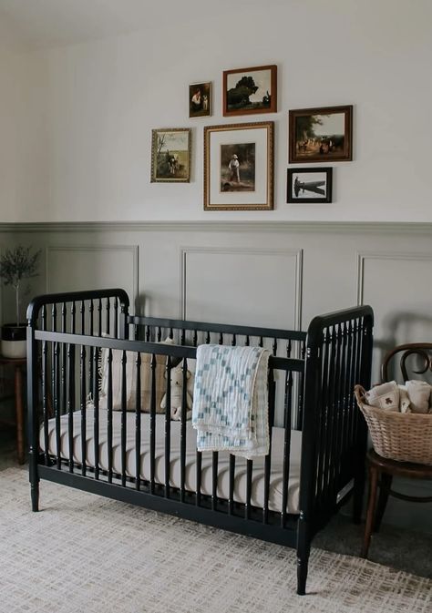 A moody and stylish nursery for a baby boy, featuring a black vintage crib paired with a dark vintage side table and chairs. Modern pillows and blankets in rich tones bring a cozy, contemporary touch to the space. The perfect blend of vintage charm and modern comfort creates a unique, soothing atmosphere for your little one. #MoodyNursery #VintageNursery #BabyBoyRoom #DarkDecor #VintageCrib #ModernPillows #CozyNursery #NurseryDesign #BabyRoomInspo #MoodyVibes #ModernVintage #NurseryStyle #NeutralNursery #InteriorInspo 2025 Nursery Trends Black Crib Nursery, Moody French, Vintage Sports Nursery, Vintage Nursery Boy, Green Nursery Boy, Black Crib, Brown Nursery, Cottage Nursery, Vintage Crib