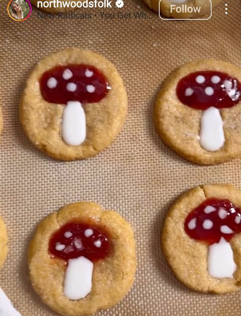 Toadstool mushroom thumbprint cookies, with jam and icing piped on after baking Toadstool Thumbprint Cookies, Mushroom Thumbprint Cookies, Halloween Thumbprint Cookies, Fall Thumbprint Cookies, Small Desert Ideas, Autumnal Cookies, Toadstool Cookies, Raccoon Cookies, Totoro Birthday