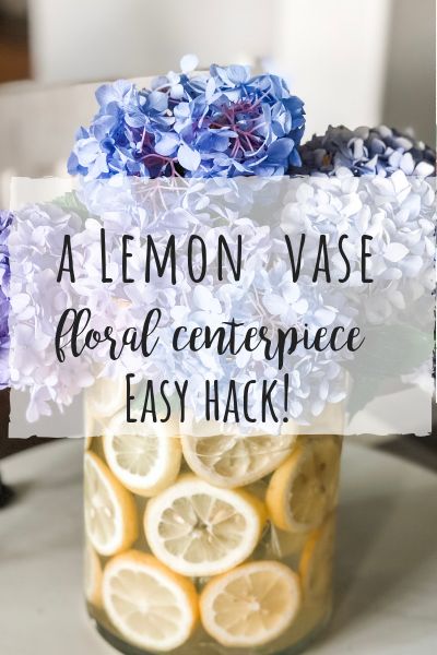 This lemon vase floral centerpiece hack is so easy and makes quite the statement! You only need 4 things to get this look! Italian Baby Showers, Lemon Vase, Inexpensive Centerpieces, Wilshire Collections, Lemon Themed Party, Lemon Centerpieces, Lemon Themed Bridal Shower, Styling Home, Lemon Flowers