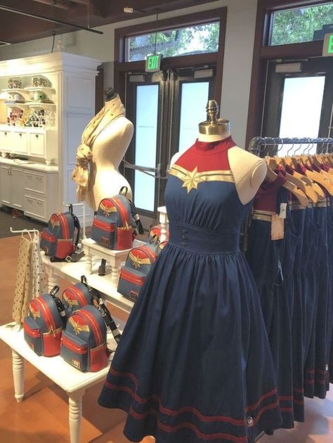 At the dress shop on Cherry Tree Lane in Disney Springs you can get the cutest captain Marvel dresses. I really like the leather jacket you can get at the marvel store too! #disney #disneyworld #waltdisneyworld #disneyparks #disneysprings #disneystore #disneylove #disneystyle #disneymerchandise #disneybound #disneybounding #captainmarvel #marvel #avengers #disneystyle #disneydress #womensfashion Cherry Tree Lane, Marvel Dress, Marvel Store, Marvel Fashion, Marvel Clothes, Dapper Day, Disney Dresses, Disney Springs, Disney Merchandise