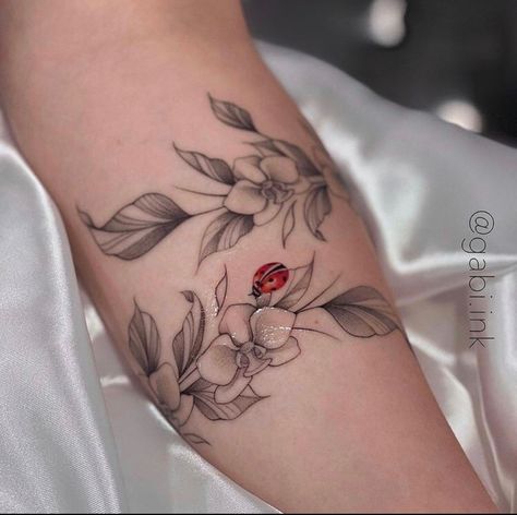 ladybug tattoo with flowers Flower With Bugs Tattoo, Flowers And Ladybug Tattoos, Flower Tattoo With Ladybug, Floral Ladybug Tattoo, Cool Ladybug Tattoo, Ladybug On Flower Tattoo, Ladybug Flower Tattoo, Ladybug Tattoos, Arm Wrap Tattoo