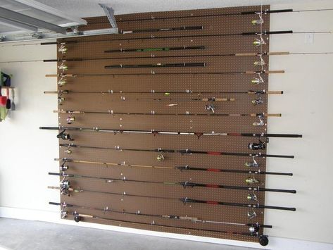 Just use whatever size pegboard you need. And space out the hooks as you need them. Fishing Equipment Storage Ideas, Fishing Pole Rack, Fishing Pole Storage, Diy Fishing Rod, Fishing Gear Storage, Fishing Pole Holder, Happy Fishing, Fishing Poles, Fishing Storage